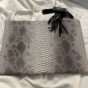 Snakeskin clutch